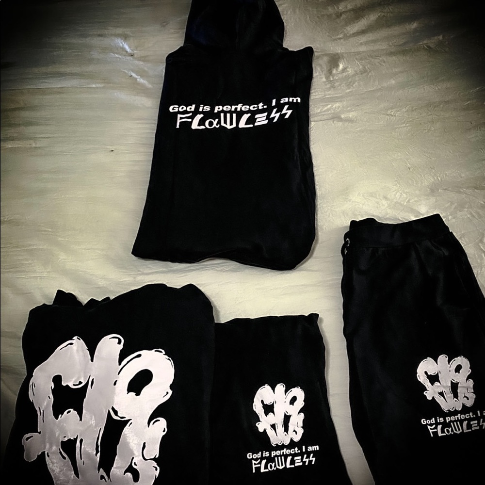 All black cotton hoody with a set of shorts.